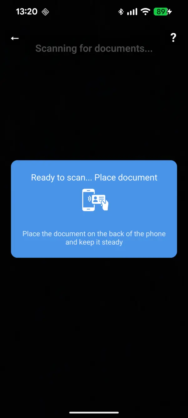 Overlay reading "Ready to scan… Place document" with an illustration of a phone and a card on its back. Caption: "Place the document on the back of the phone and keep it steady"